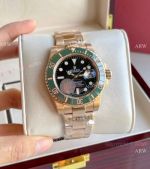 Rolex Submariner Rose Gold Green Ceramic Bezel Watch 40mm
